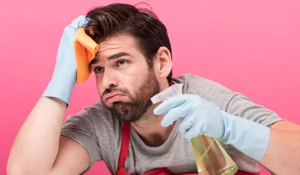 young man looking stressed for cleaning